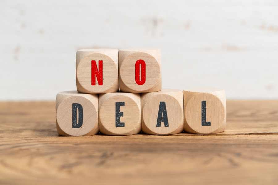 No deal blocks representing a home loan closing delayed by insurance problems