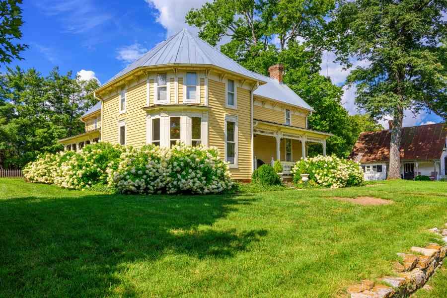 Older home exterior representing homeowners insurance questions before closing